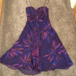 Beautiful floaty summer dress by monsoon in size 10. Shoestring straps and short zip to back. Scarf details to front.