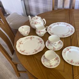 6tea cups and saucers, 6 tea and dinner plates, 6 coffee cups and saucers, teapot, milk and sugar and cake plate. Duchess Bone china