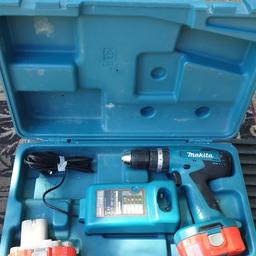 as seen in the pictures 2x battery
drill and charger
