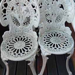 cast iron style garden set table and 4 chairs