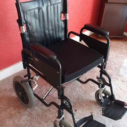 folding wheelchair with removable foot rests,cushion,,fits easily into car boot