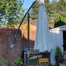 3m cantilever parasol in cream been stored in shed so needs a clean as you can see in pictures comes with base has crank lever to put up and down ...has several positions that parasol can be put in covers a large area with being 3 meters
canvas can be machine washed or just jet wash it collection only comes in 2 parts