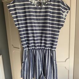 Blue and white strip playsuit with pockets and tie up back size would say 12/14