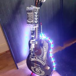 guitar with Jack Daniels logos bar optic bottle opener and multifunction lights with remote control brand new looks cool on a stand or wall hung bottle and stand not included £90 + £12 Hermes courier delivery