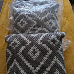 3 x lovely 17 inch  grey/ white cushions from next. (( new and wrapped)) cost £16 each. selling all 3 for£10. see all pictures. pick up Newton Aycliffe.