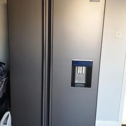 samsung American fridge freezer with water dispenser, like new excellent working order.