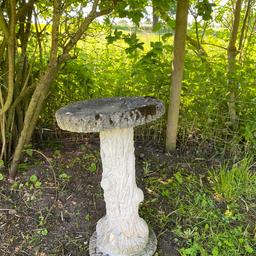 Lovely stone bird table
