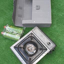 single ring gas camping stove with 2 canisters. good condition. check out my other items