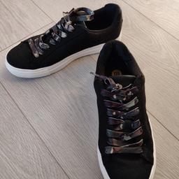 Ladies River Island trainers size 6 in black with camo laces. Worn only twice so in immaculate condition. From a smoke free and pet free home. Safe collection Wallasey CH45 or will post for additional cost. PayPal accepted.