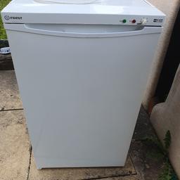 Indesit under counter freezer, old but in very good working order top shelf broken on one side.