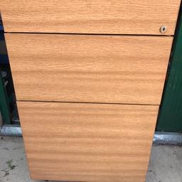 Three drawer filing cabinet in beech colour

28 tall x 17 wide x 24.5 inches deep.

This is a high quality professional office cabinet from a office furniture manufacturers so is solid.

Cost a fortune new!

Collection from Middleton M24