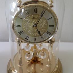 Hermle carriage mantel clock glass dome rotating pendulum gold colour made in Germany.

Battery operated, 1 x AA size.

Condition is "Pre-loved"

Approx dimensions
Height 9 inches
Diameter 6 inches

Collection in person.