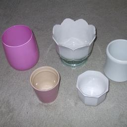 5 Plant Pot Holders
Pink Glass 6" x 4 1/2"
Green/White Petal - M & - 5 1/2 x 6" (very small chip on inside of one petal)
Med. White 5" x 4"
Small White 3 1/2" x 3 1/2"
Small Pink 4" x 4"