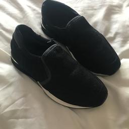 Girls black trainers size 13 in good used condition from smoke and pet free home