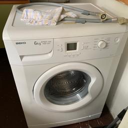 Washing machine Beko it is used still works well just have to push the door up to close it collection only
