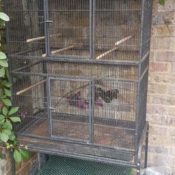 large cage. With stand on wheels.
Used but in good condition.
Can be dismantled.
The tray is rusty but has no leak or any issues as shown in the pictures.

Width 77cm
Depth 46cm
Height 155cm

pick up from uxbridge
original price £130
message me if you would like more information.
07950881819