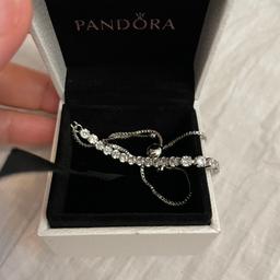 Brand New Genuine Pandora Tennis Bracelet. 

Unwanted gift. 

Available or immediate collection or can post for charges. Thanks.