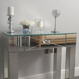 Glitz and glamour table, perfect for greeting guests in four block legs, this design is covered with mirrored panels creating a personality-packed piece. A single drawer with a classic look.
76cm H x 79cm L x 36cm D,

wayfair price £177.95
assorries not included
brand new

Price £120 no offers