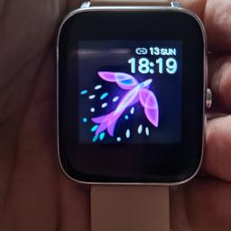 this is a fit bit/smart watch
connects too your phone does everything a smart watch does
pink strap

collection only