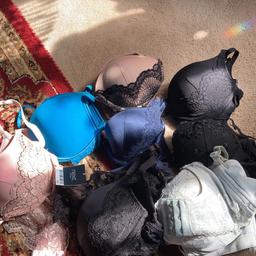 All brand new padded bras size 34a two with matching briefs size 10 8 in total