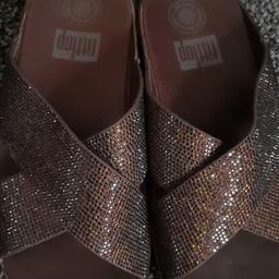 genuine fitflop ....size 3 mules with crystal detail....very comfortable...only tried on around the house...took tags off befor checking size..too small for me..original price over£80...collect hx1...can post for £3 extra (paypal only for postages)