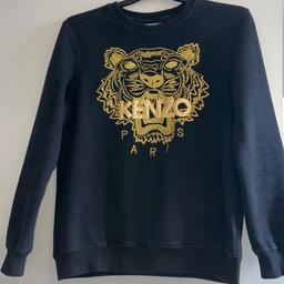 Hi im selling this lovely kenzo jumper size xl it's in excellent condition it's dark blue and gold this is an original kenzo.