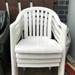 4 white garden chairs
