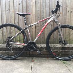 Giant Revel Mountain Bike
Front suspension
Hydraulic brakes
29” Wheels
Rides really well

(NOT CARRERA VOODOO PITCH BOARDMAN)