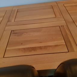 light oak table and 4 chairs brown seating very good condition and extends