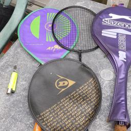 Three badminton . Look at both picture . Two of them comes with cover.