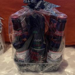 Comes as pictured wrapped with bow great for Father’s Day has four Budweisers lynx shower gel and whiskey glass with happy Father’s Day