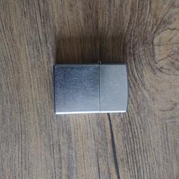 Used scratches effect stainless steel colour ZIPPO.
Good condition.
No box.