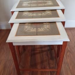 Nest of wood tables refurbished with tiled design decor. 
Collect from Wallington SM6.
Local Delivery possible