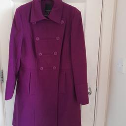 beautiful and elegant mid length coat, in deep plum colour, double breasted, 2 pockets, in excellent condition, only worn once to try on, size 18,from debenhams.Collection only please. Thanks