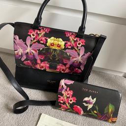 Used and has some signs of wear but very hard to see unless you look closely on the strap and bottom/corners 
Inside is clean
Purse is in great condition 
Price is for both