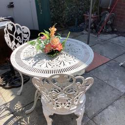 Metal bistro set for garden, heavy metal table with 2 chairs, has been painted white, will need a repaint, solid set.