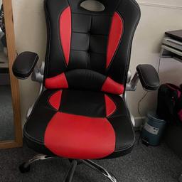 red and black gamming chair on wheels.  Little worn to the seat and the back of the chair. apart from that great condition 

see pics 4 and 5

collection only