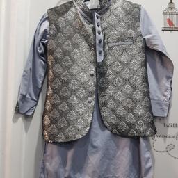 boys grey shalwar kameez with waist coat. one button is missing from the one selvees. excellent  condition.