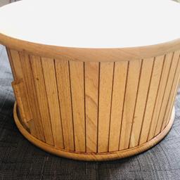 John Lewis 30cm Large Contemporary Circular Wooden Breadbin.


Tambour style door


RRP £35


Condition is "Used" excellent condition except water mark to top. This can easily be sanded away if required


Dispatched with Hermes