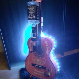 Jack Daniel's Guitar Bar. Condition is "New". Dispatched with Hermes 
Brand new jack Daniel's guitar bar with bar optic and bottle opener.  Multifunction lights with remote control.  Looks cool on a stand or wall hung.  Bottle and stand not included.