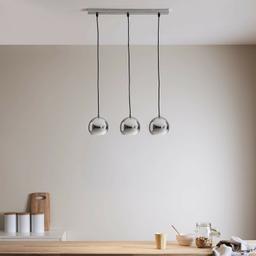 This modern Roccheta pendant features 3 globe chrome effect shades and would be a stylish addition to your kitchen or dining space fitted above a dining bar or table.

Roccheta chrome Light
3 Lamp Pendant
Takes E14 bulbs
Drop: 1080mm
Diameter: 140mm
Height: 1080mm
Non-dimmable
Fittings & fixings included

Purchased brand new, but decided to not use, only marked box with pen on side bar lights so unfortunately can't return
RRP £49