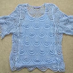 Really gorgeous, lovely crochet lady's top with festoons at the hem of the top and along the edge of the sleeves. Label says size L will fit size 14 and matching lining size M, but lining very stretchy will be fit size L. All measurements on pic.4.

The top is in excellent condition no pull marks in the material, no holes. Has been worn a couple times only and has been cleaned. If you would like more pictures contact me without hesitation.
No returns accepted.

Postage price: + £4.10