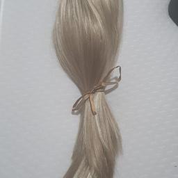 brand new never worn, 22 inch clip in hair extension you can wash this and also have a light heat over it so you could dry it and straighten it. only selling due to having a different hair colour now, as you can see I paid £69 for this so grab a bargain