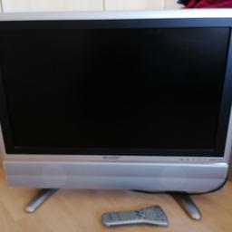 Silver 26" Sharp television with remote & manual, perfect working order, no damage, may be able to deliver locally