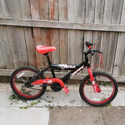 Red and black huffy rebel. All in good working order and good condition.