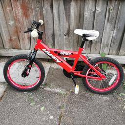 Red and black huffy ignite. In good working order and good condition.