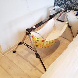 Great used condition. Only been used for 4 months. Bought for £100. Includes 3 cotton khoyu(2 brand new and 1 used), extra set of hangers and a pink insert that comes along with the swing (never used). Comes with a travel bag not included in pictures but is there to collect. Great for babies from birth+ up until they outgrow the swing. Weight limit is 20 kg. Very comfortable for babies when you either use the insert or small rectangular foam mattress inside khoyu (we did that).