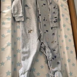 Next 6-9 month. 2 babygrows, blue with animal detail. Excellent condition