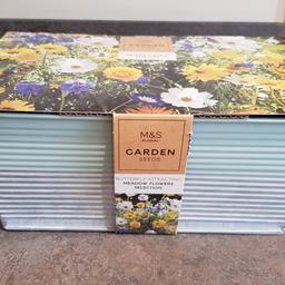 Lovely floral M&S Garden seeds gift comes with nice planter, potting compost and seeds.