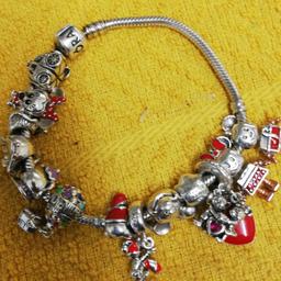 Pandora Disney charm bracelet
 13 charms in total
good condition 
£75 or nearest offers 
no time wasters 
thanks